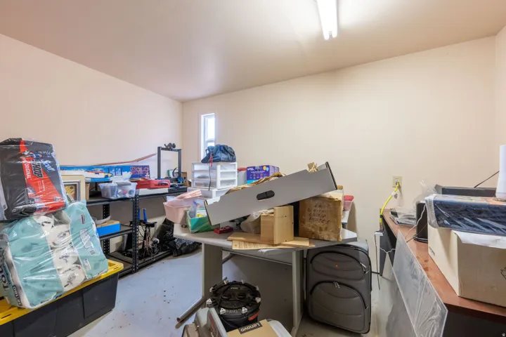 Misc room with concrete floors