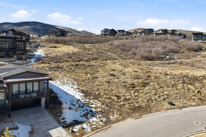View of mountain backdrop with nearby suburban area