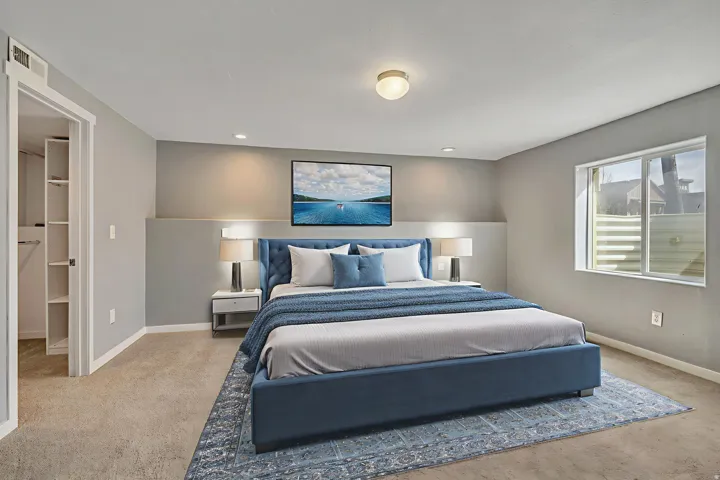 Bedroom featuring light colored carpet and recessed lighting