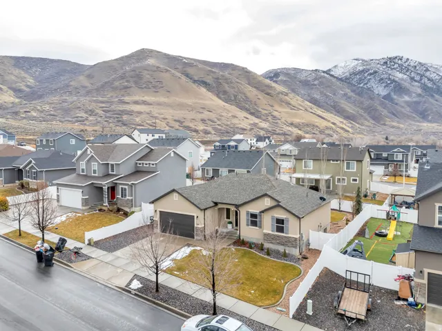 View of mountain backdrop with nearby suburban area