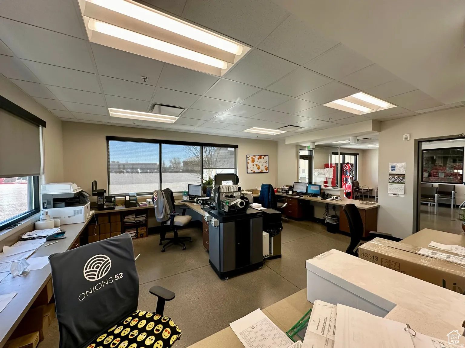 Home office featuring a drop ceiling