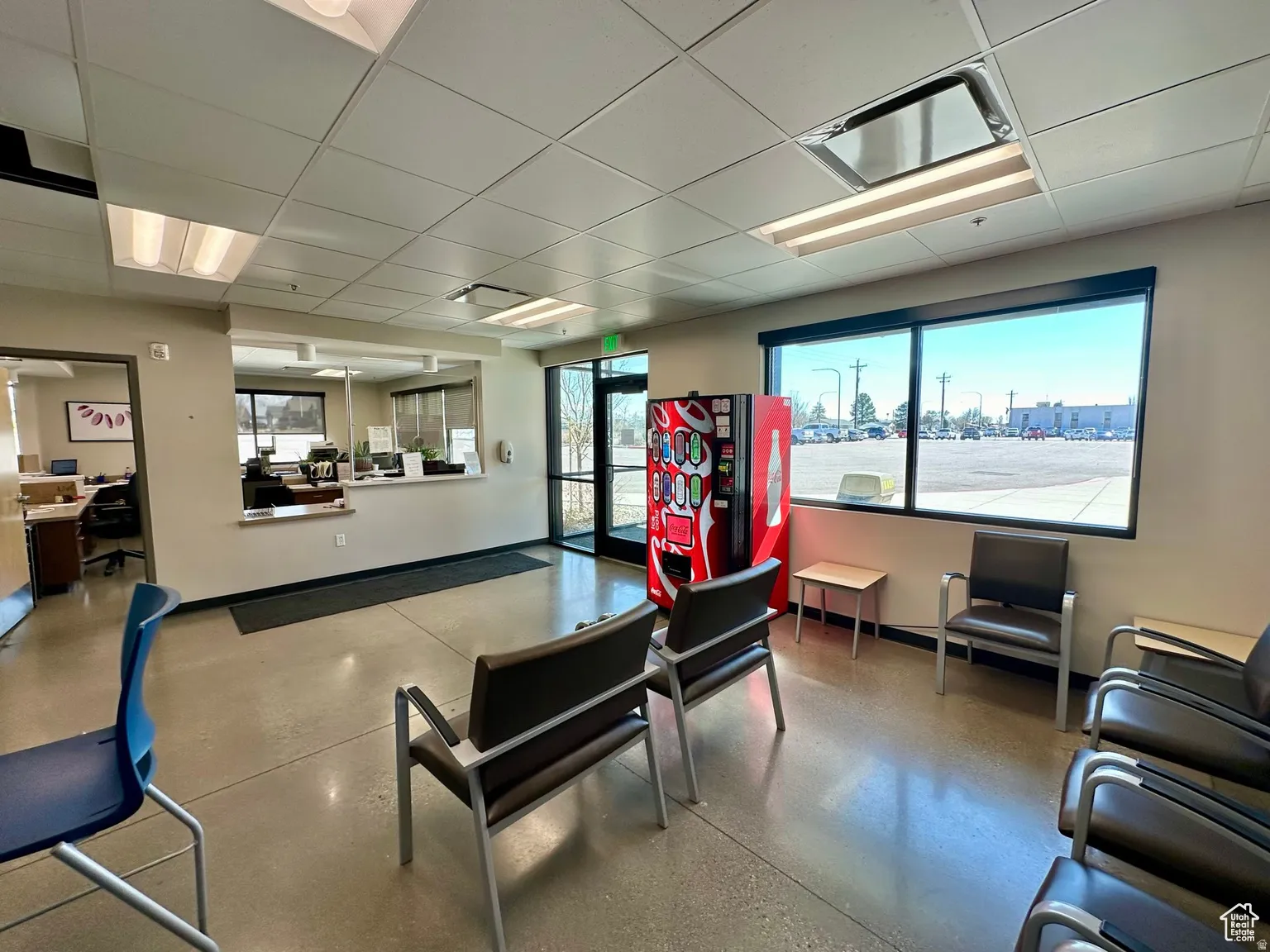Lobby with a paneled ceiling and a city view