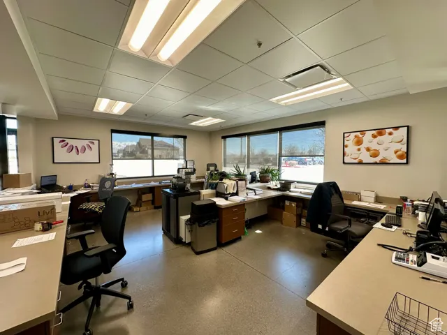 Home office featuring a drop ceiling