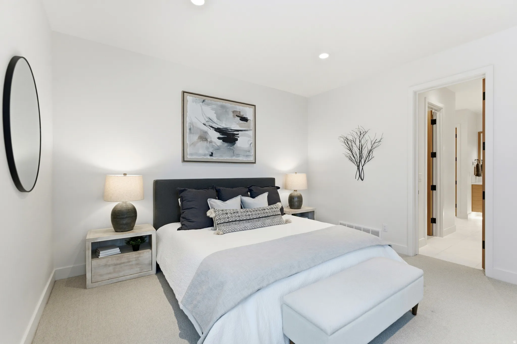 Bedroom featuring light colored carpet and recessed lighting