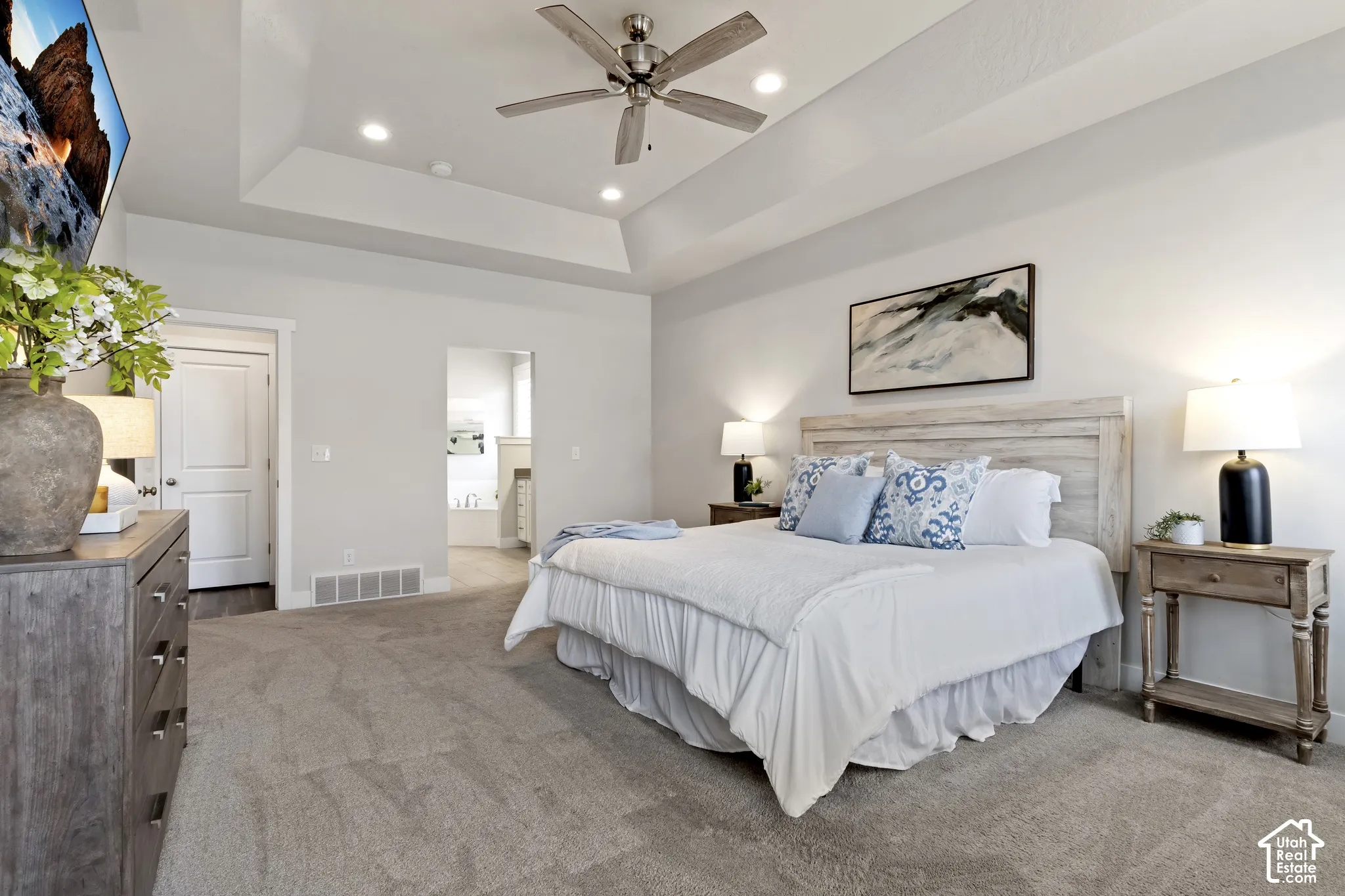 Main-level primary suite offering privacy, generous square footage, and convenient single-level living.
