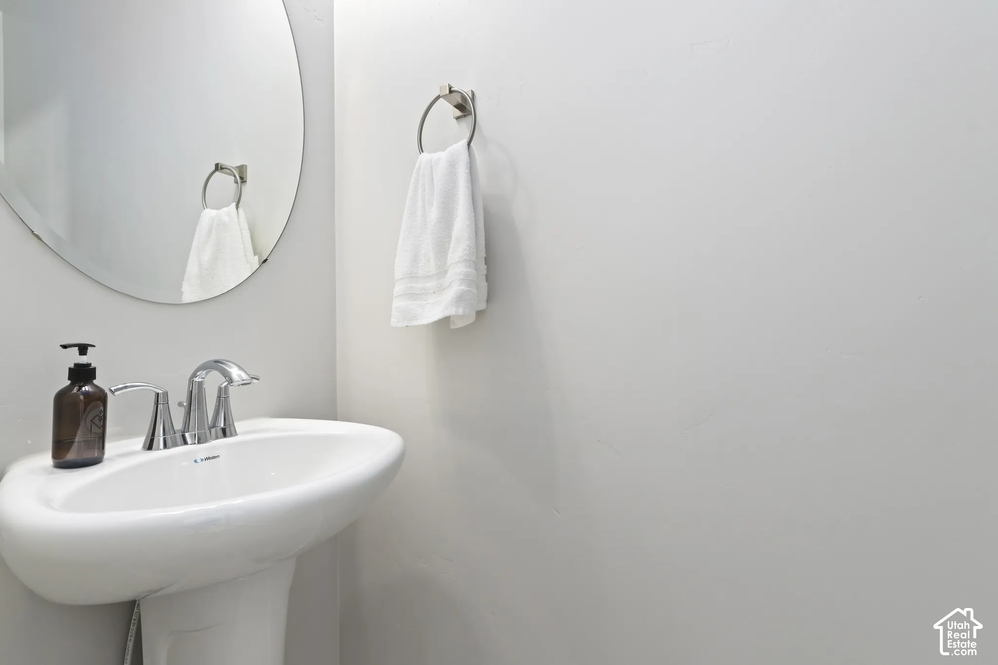 Convenient main-level powder bathroom for guests.