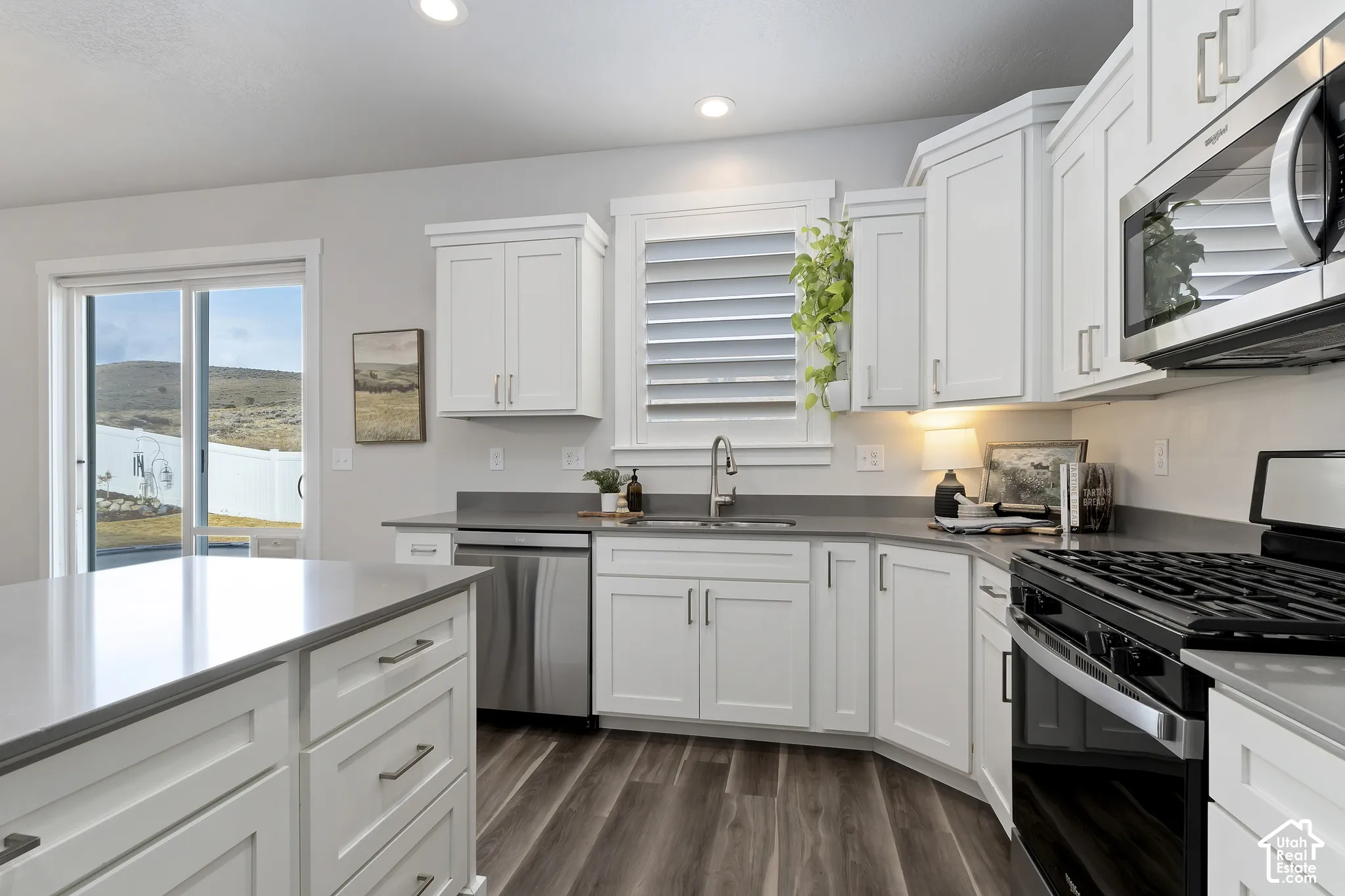 Dining area overlooking the backyard with easy access to the patio for indoor-outdoor entertaining.