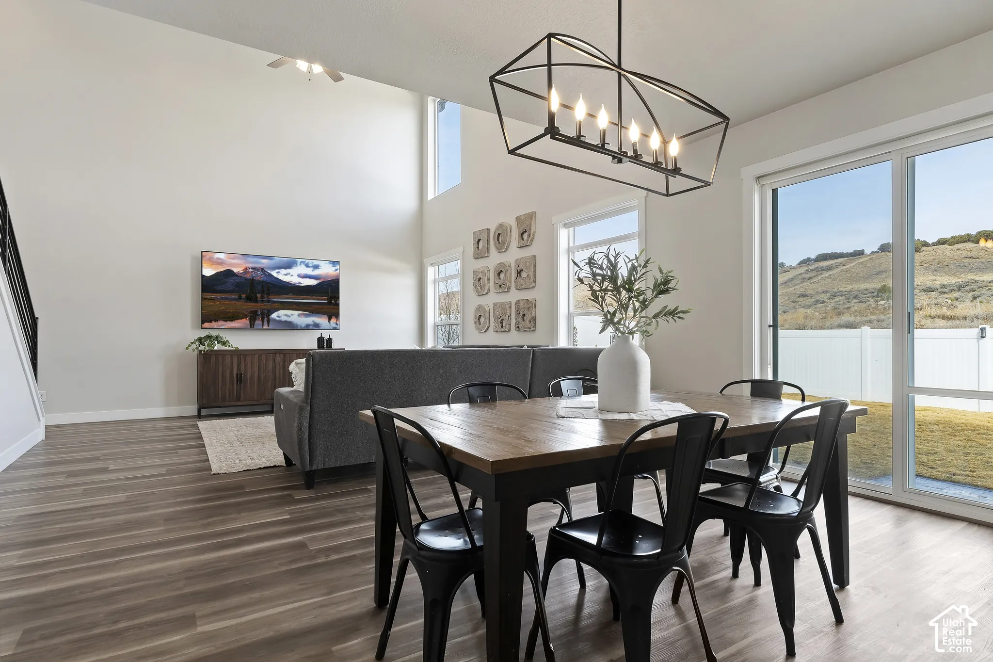 Dining area with abundant natural light and direct access to the backyard patio for effortless entertaining.