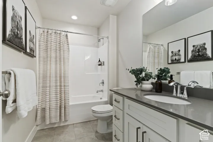 Great room showcasing soaring two-story ceilings, expansive windows, and an open floor plan designed for gathering.