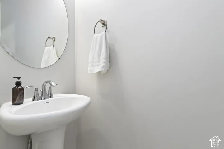 Convenient main-level powder bathroom for guests.