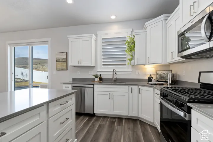 Dining area overlooking the backyard with easy access to the patio for indoor-outdoor entertaining.