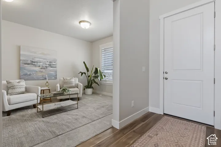 Additional main-level flex room ideal for a home office, music room, or formal sitting area.