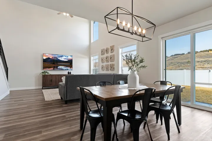 Dining area with abundant natural light and direct access to the backyard patio for effortless entertaining.
