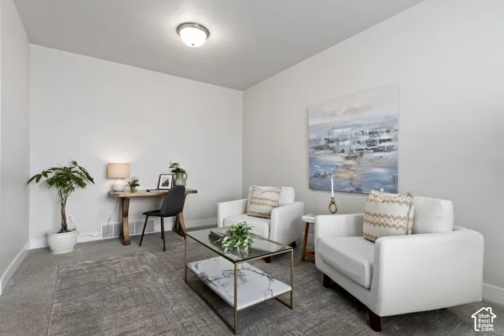Additional main-level flex room ideal for a home office, music room, or formal sitting area.