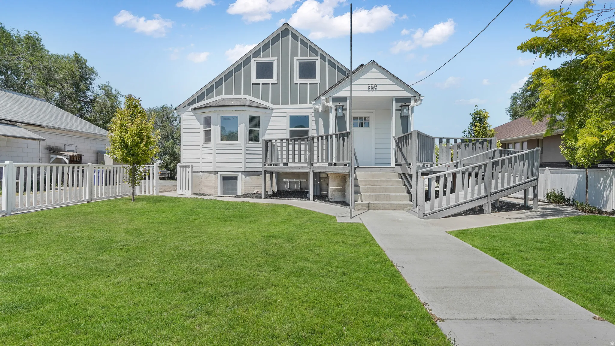 Rear view of property featuring board and batten siding