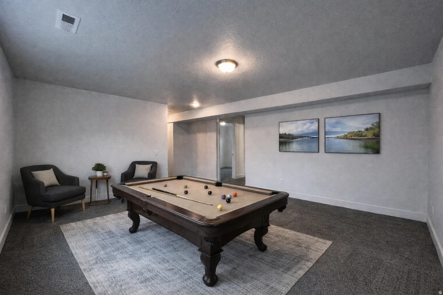 Playroom with billiards table and carpet floors
