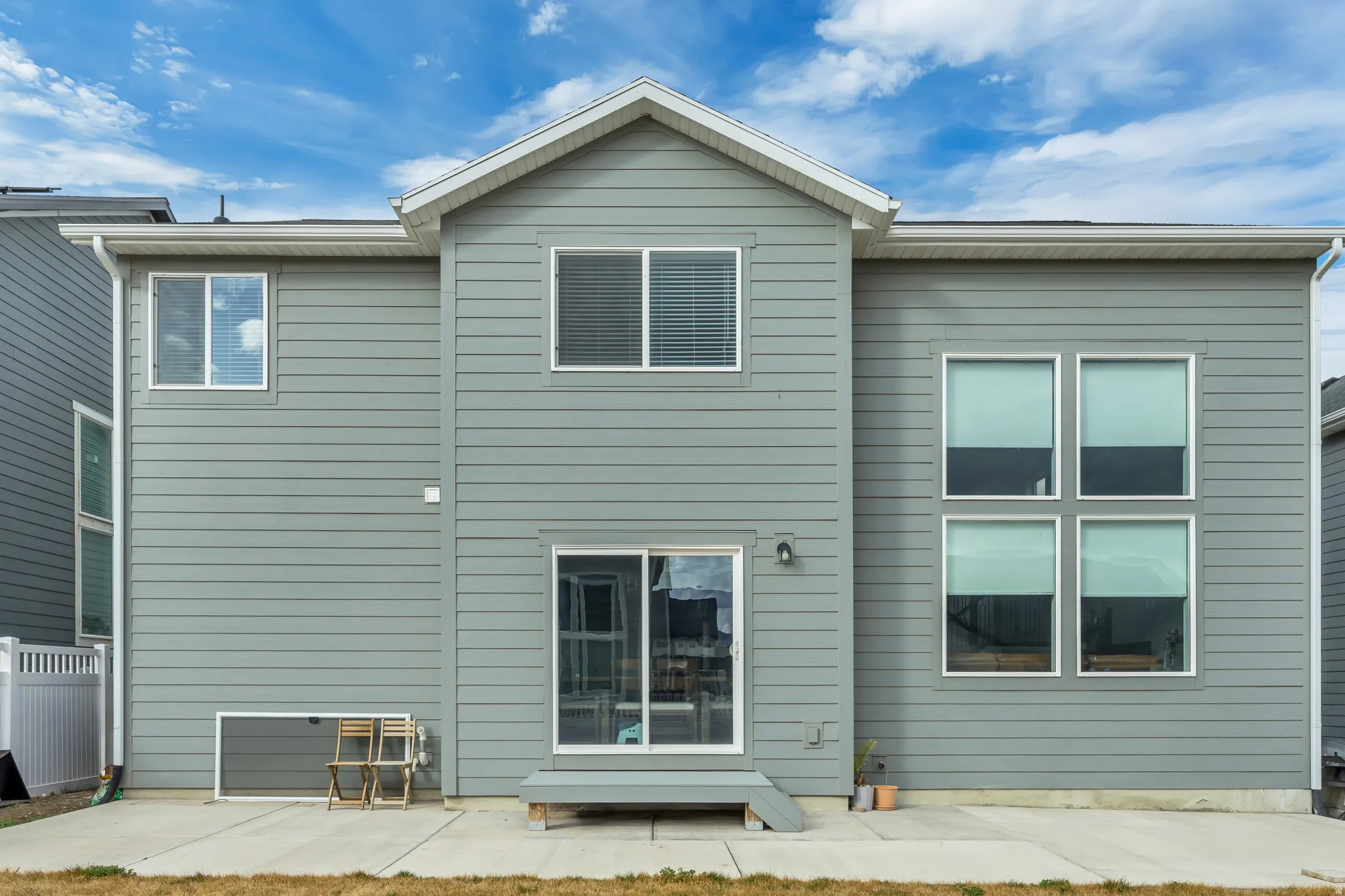 Rear view of property featuring a patio