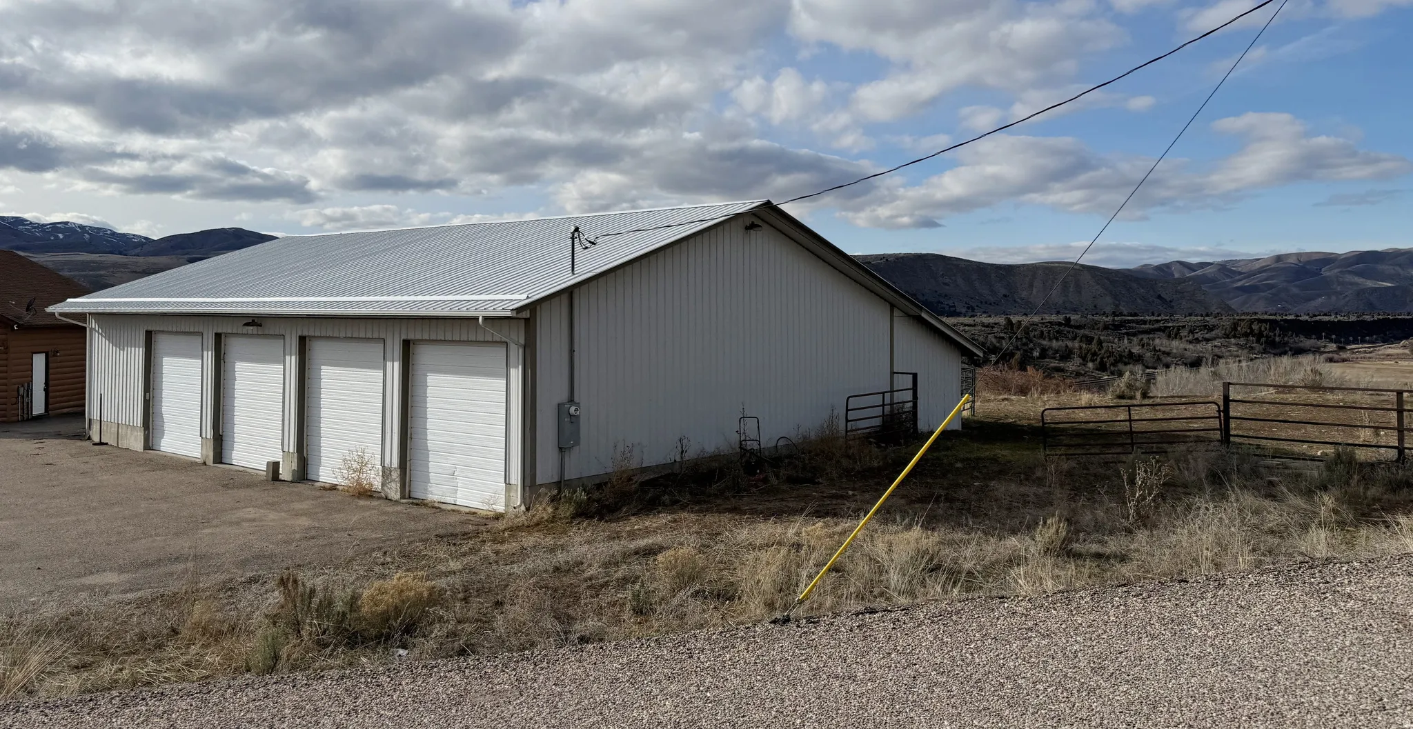 Detached garage featuring a mountain view