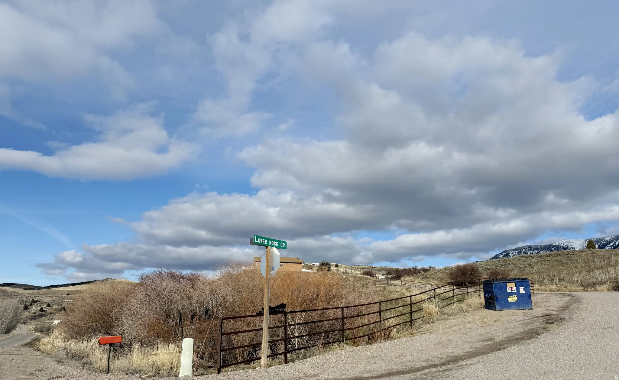 View of asphalt street featuring a view of countryside