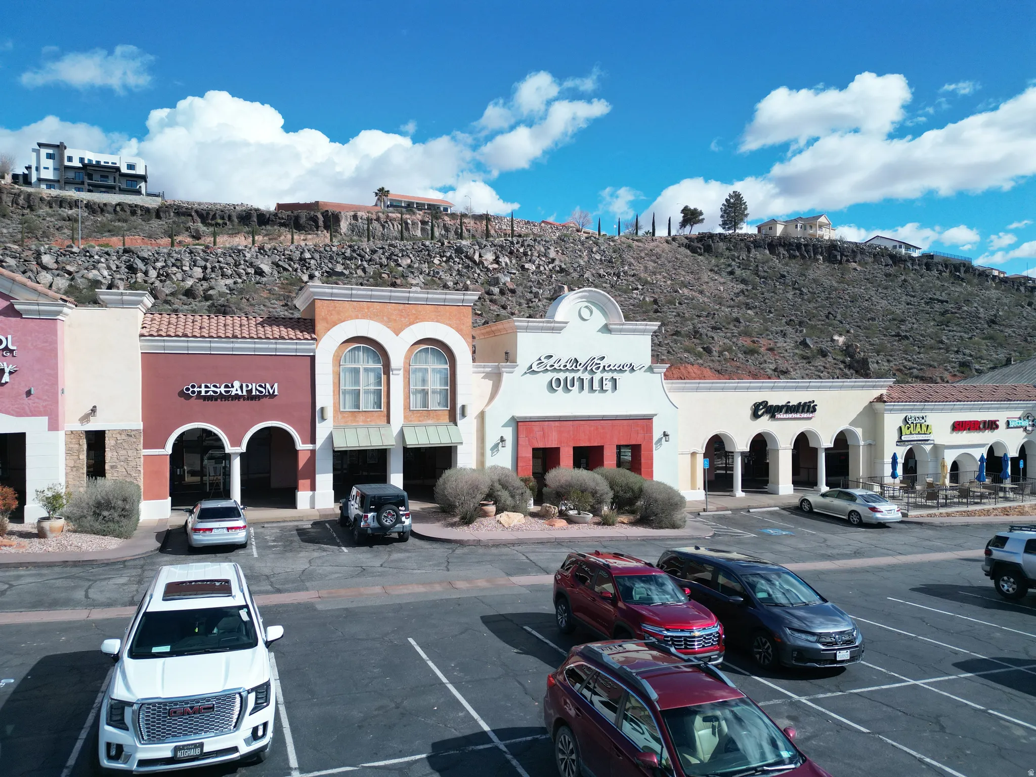 View of commercial location with uncovered parking