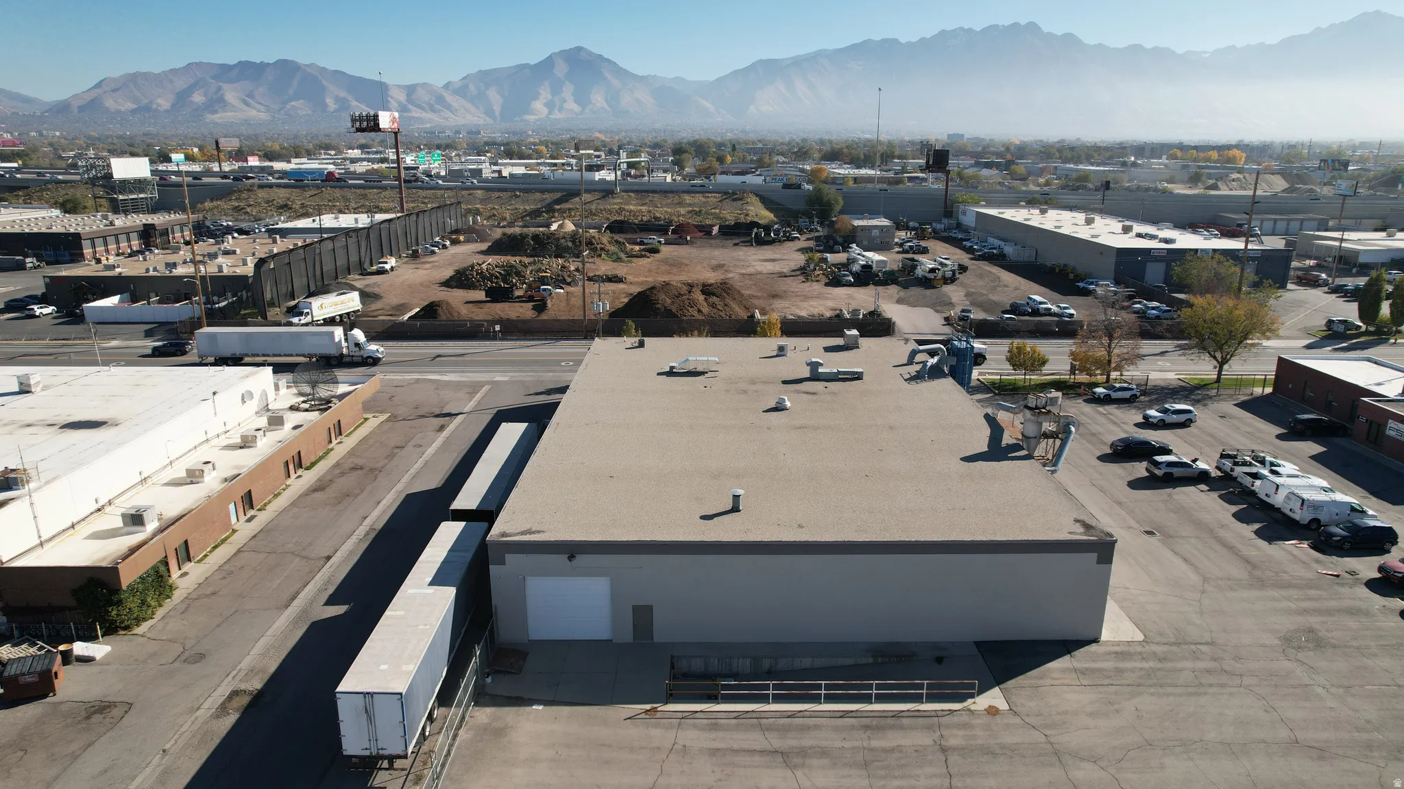 Bird's eye view of an industrial area and mountains