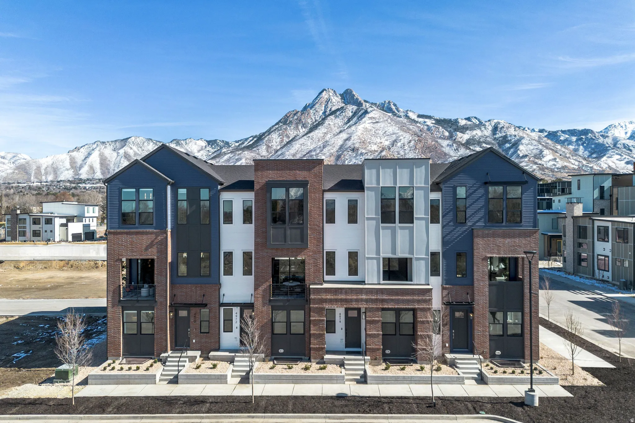 View of property featuring Urban brownstone exteriors.  Model image for marketing purposes.