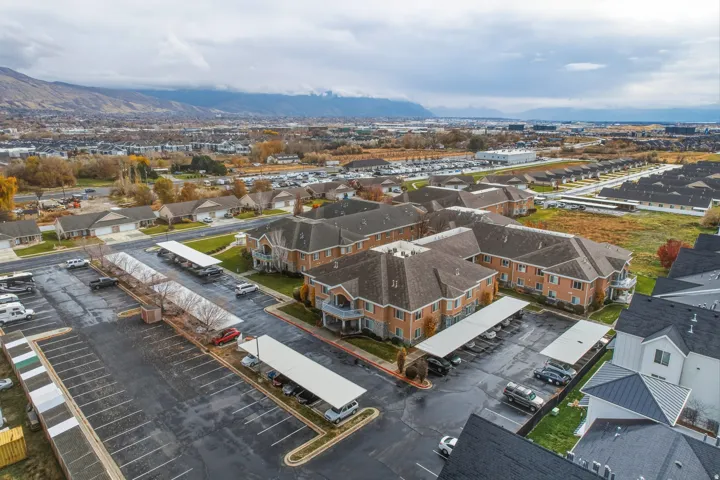Aerial view of residential area featuring a mountain backdrop