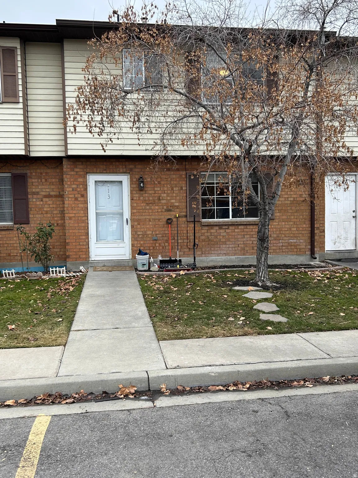 View of front facade featuring brick siding