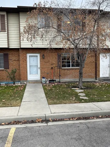 View of front facade featuring brick siding