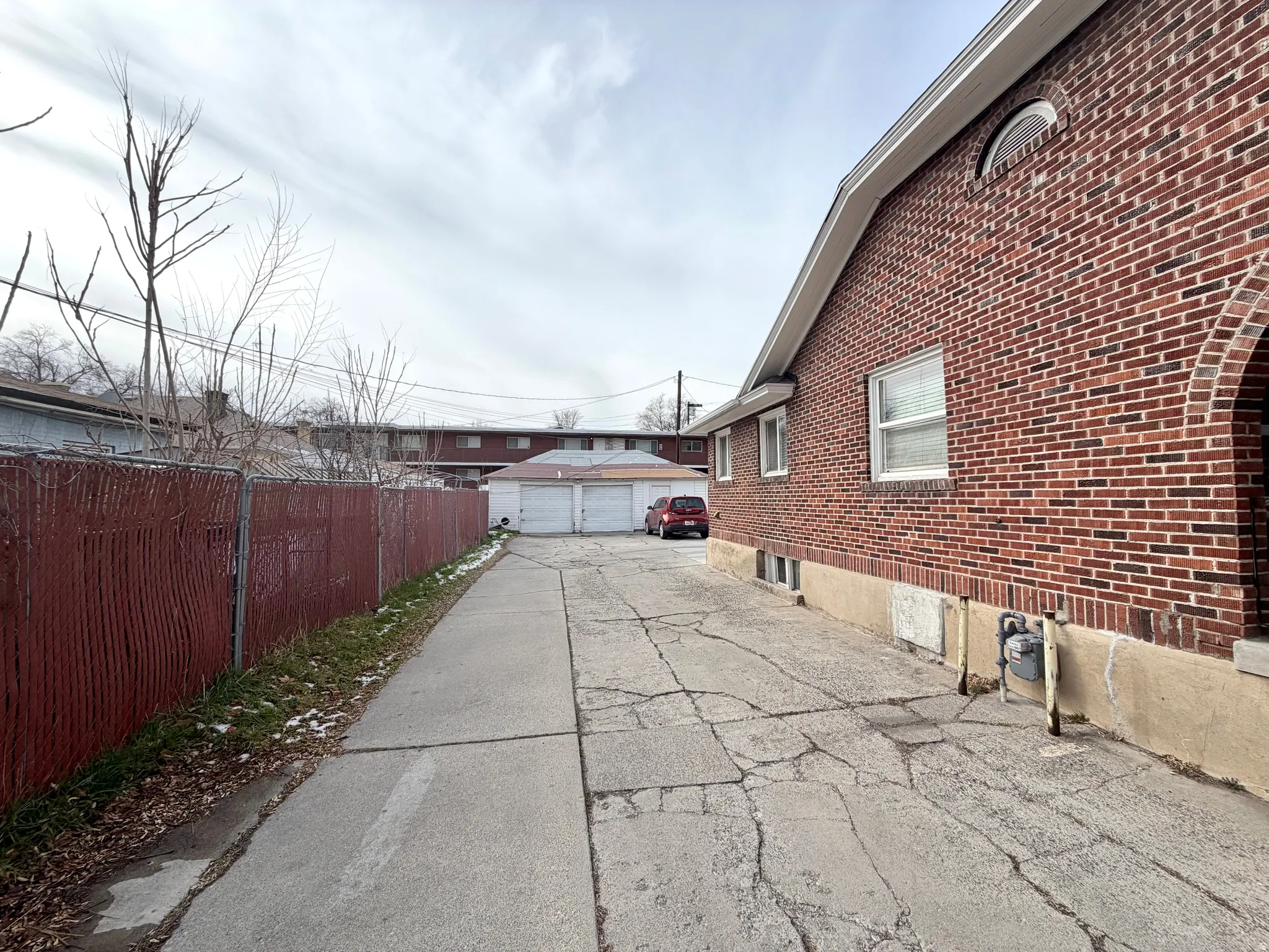 View of patio / terrace with an outbuilding and a detached garage