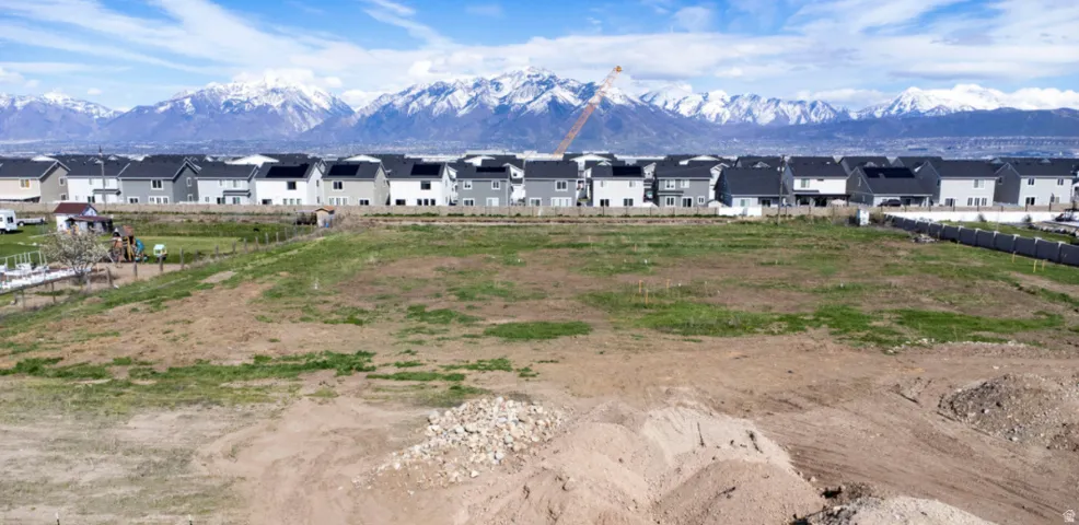 View of mountain backdrop with nearby suburban area