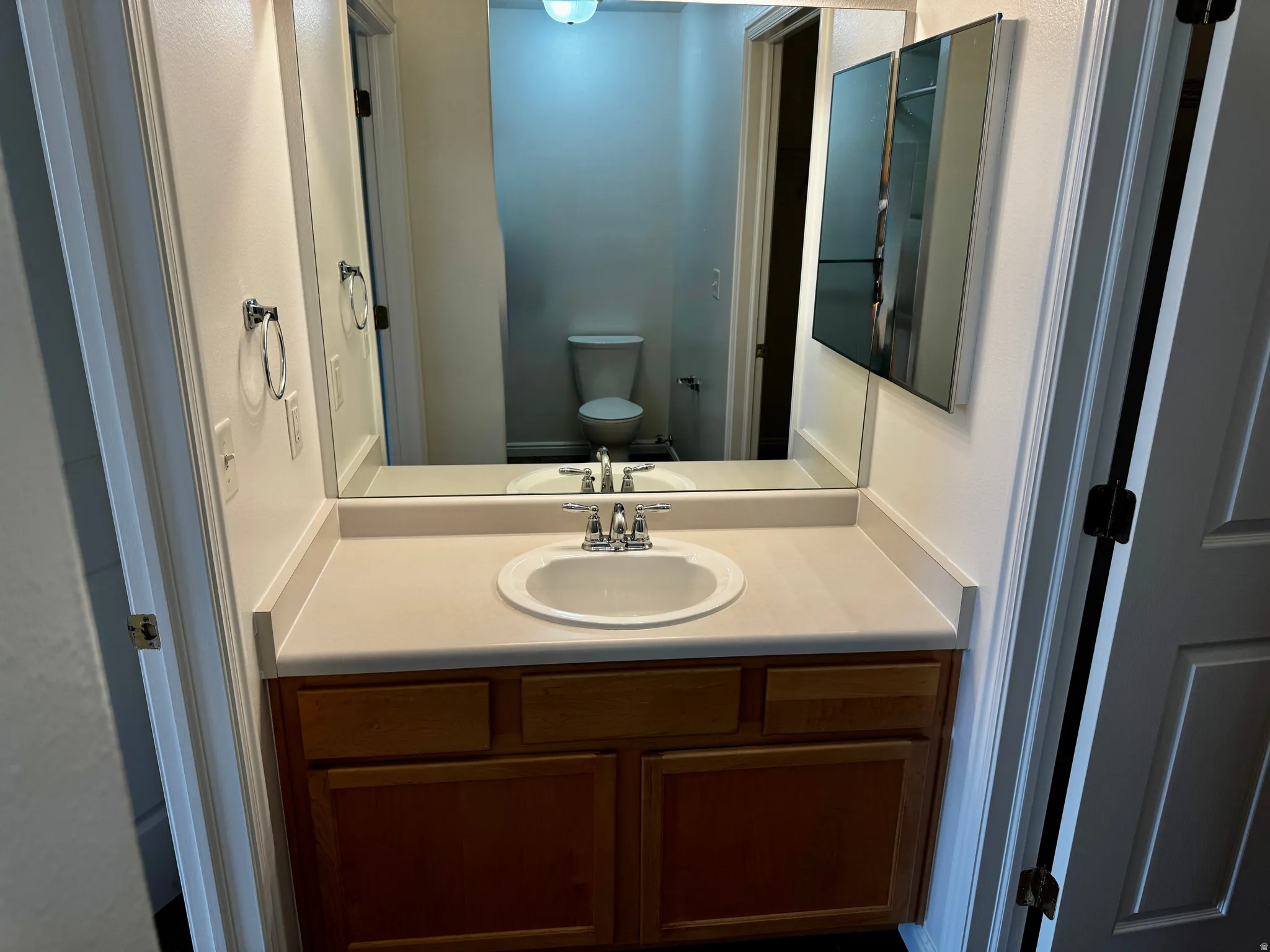 Bathroom featuring toilet and vanity