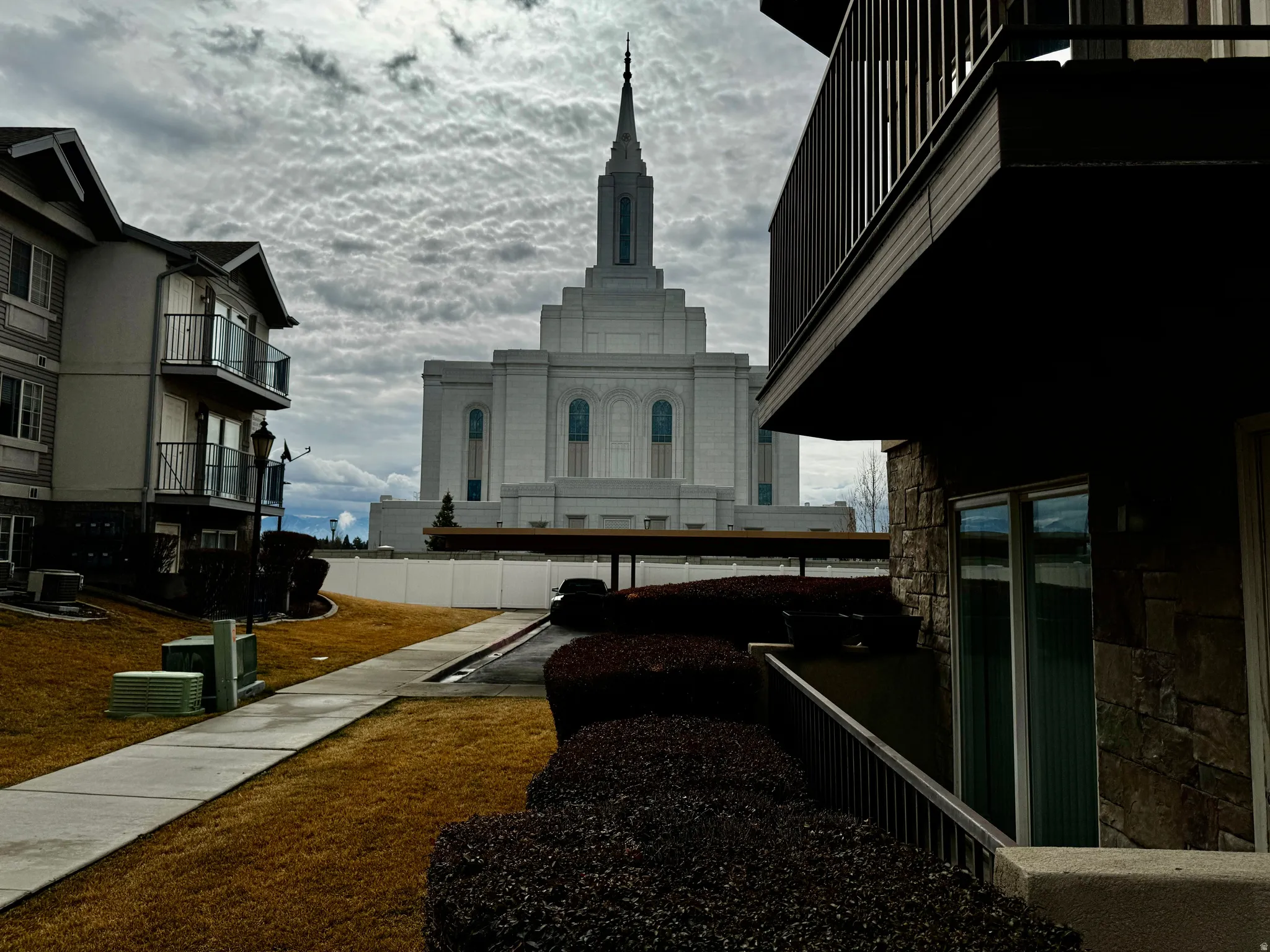 Exterior space featuring a balcony