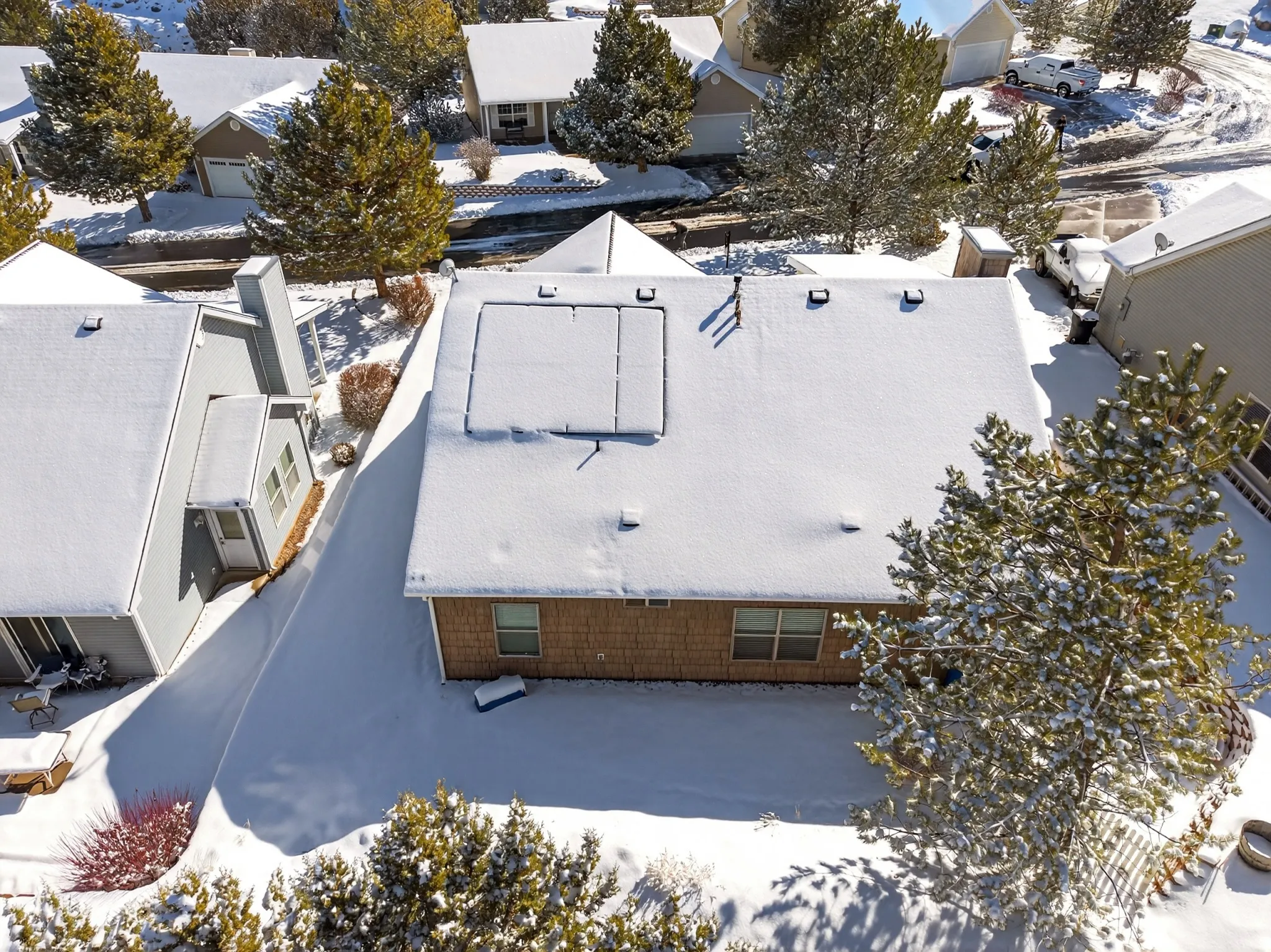 Snowy aerial view with a residential view
