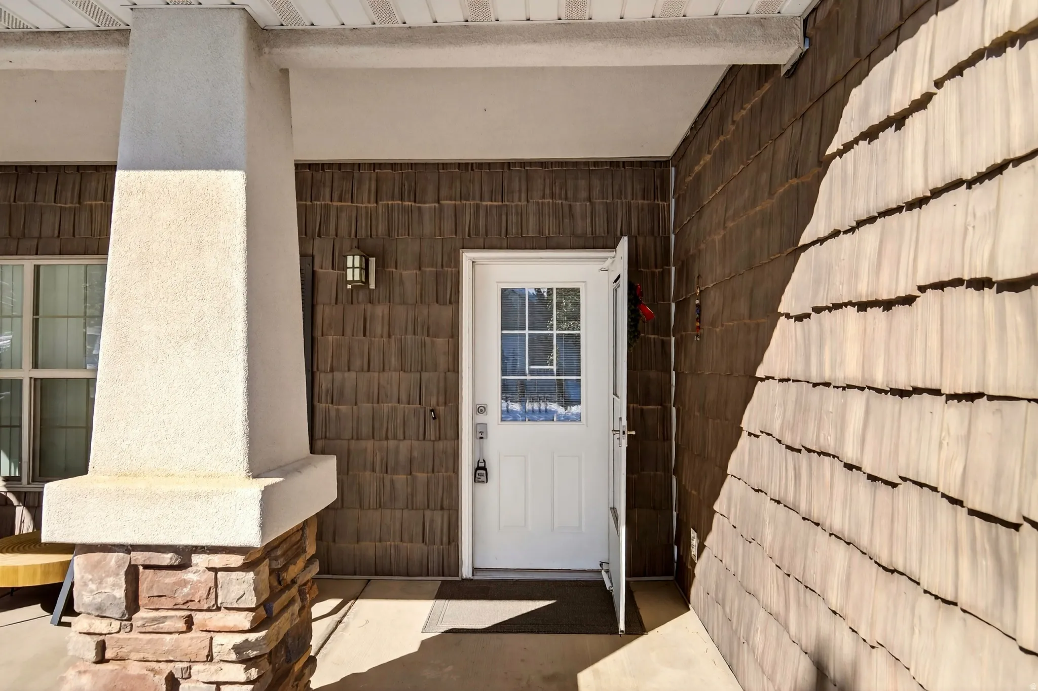 Doorway to property with a porch