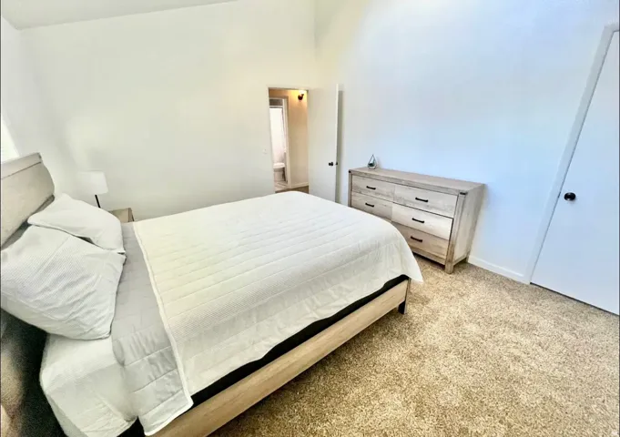 View of carpeted bedroom