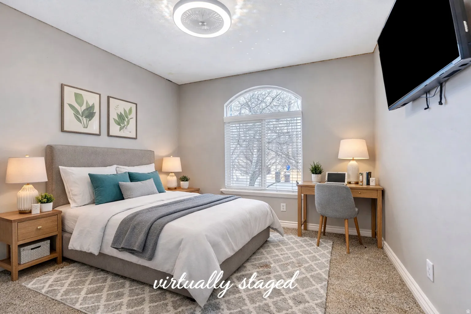 Bedroom featuring light colored carpet and an office area
