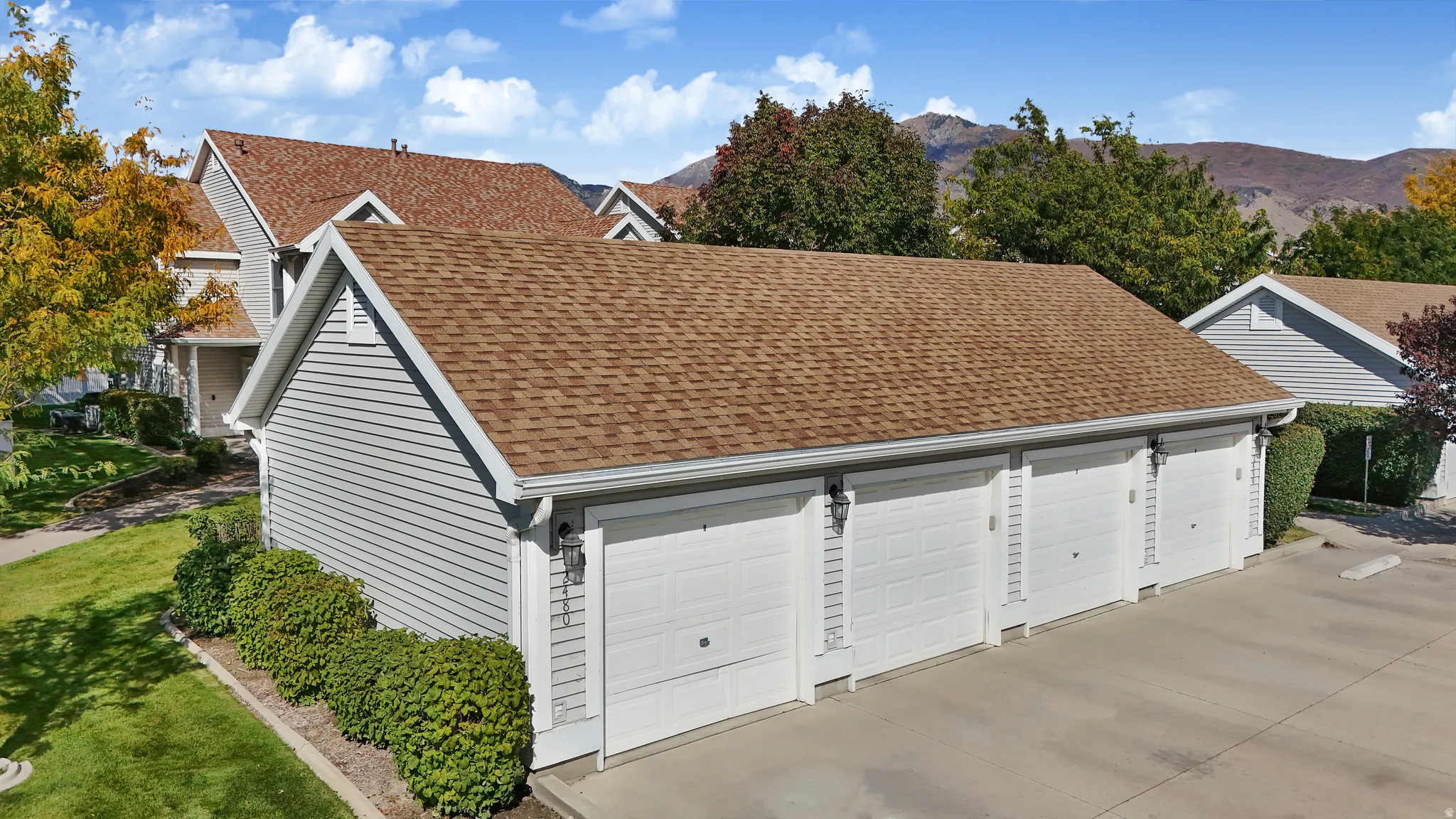 Detached garage featuring a mountain view