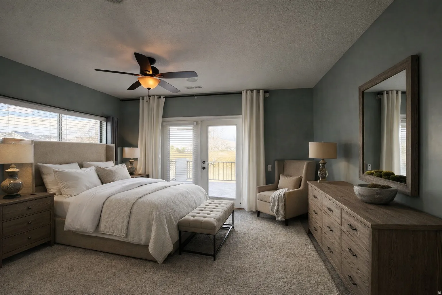Carpeted bedroom with access to outside, a ceiling fan, and a textured ceiling