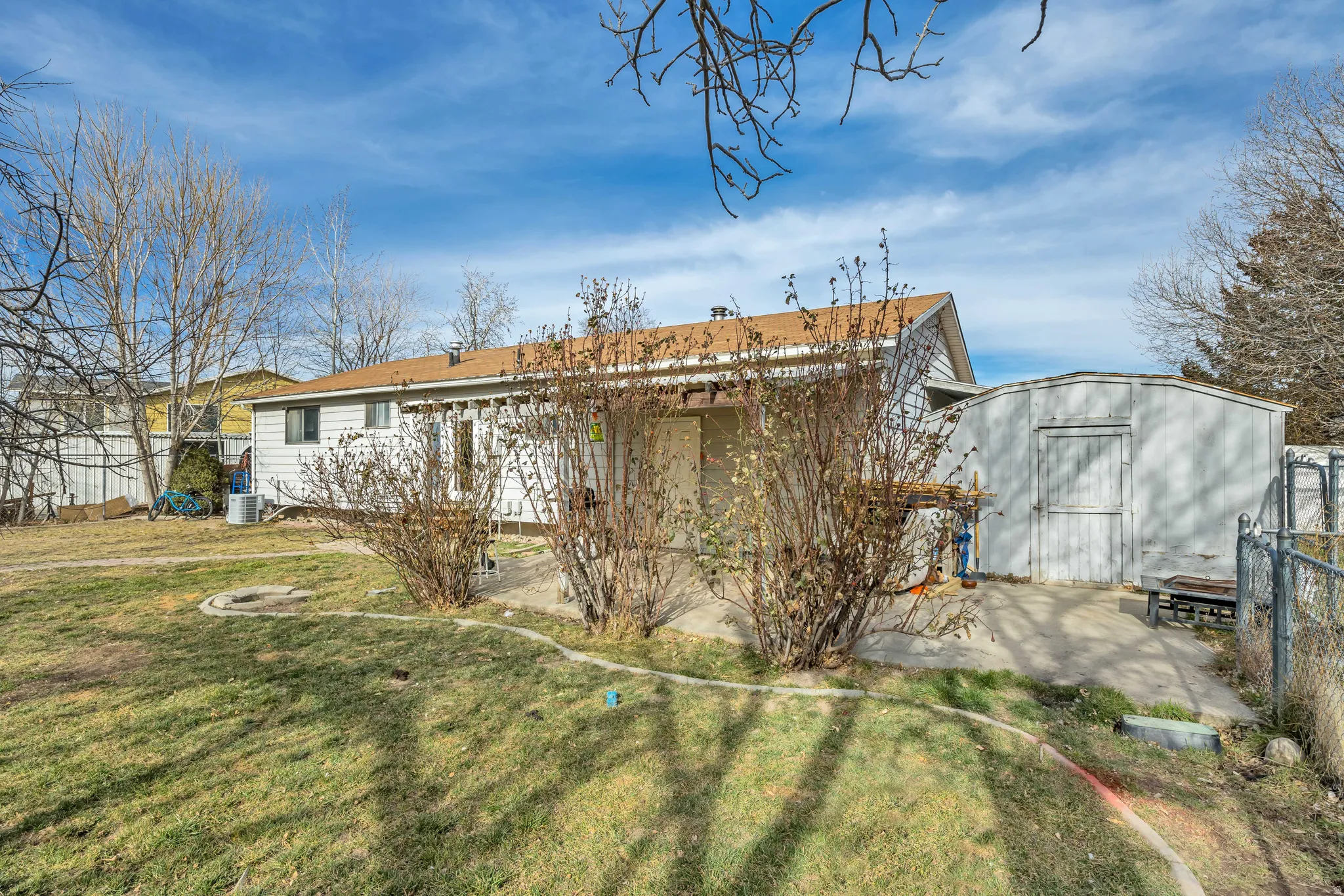 Back of property with a storage unit