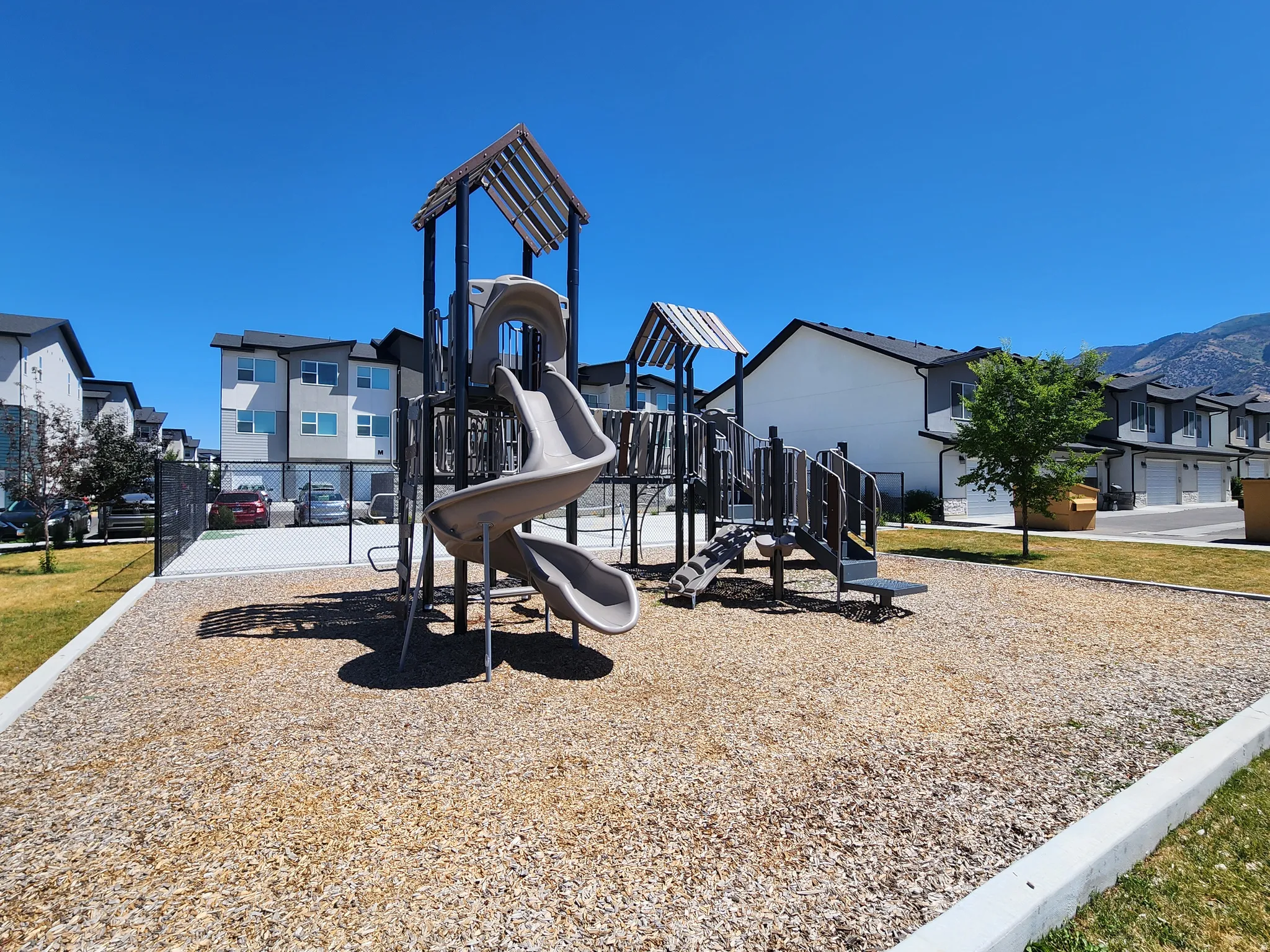 Communal playground featuring a residential view
