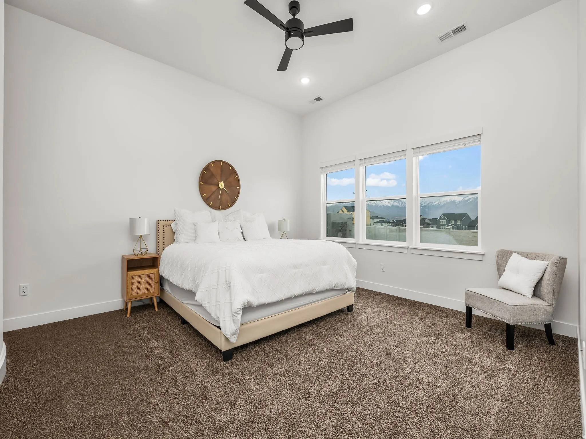 Primary bedroom with private en' suite and walk in closet.