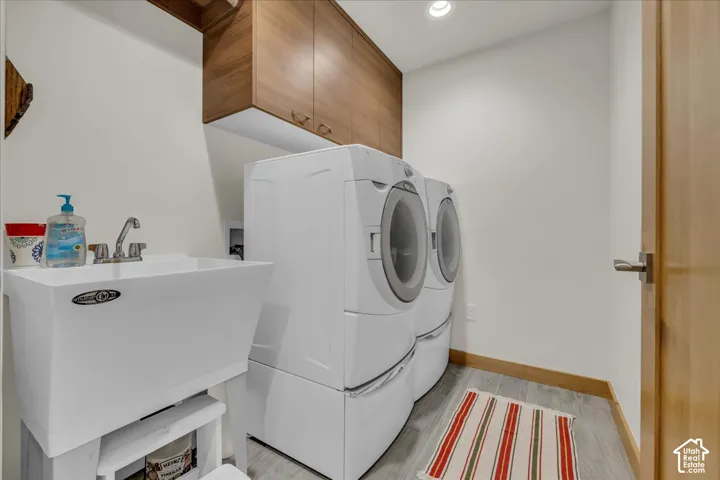 Laundry room conveniently located close to the ski/mud room