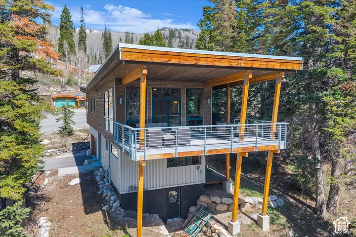 Covered back deck and basement level yard