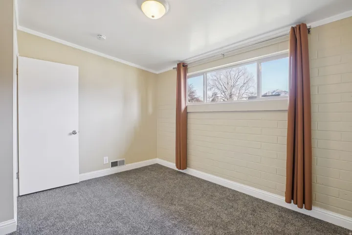 Carpeted bedroom #1