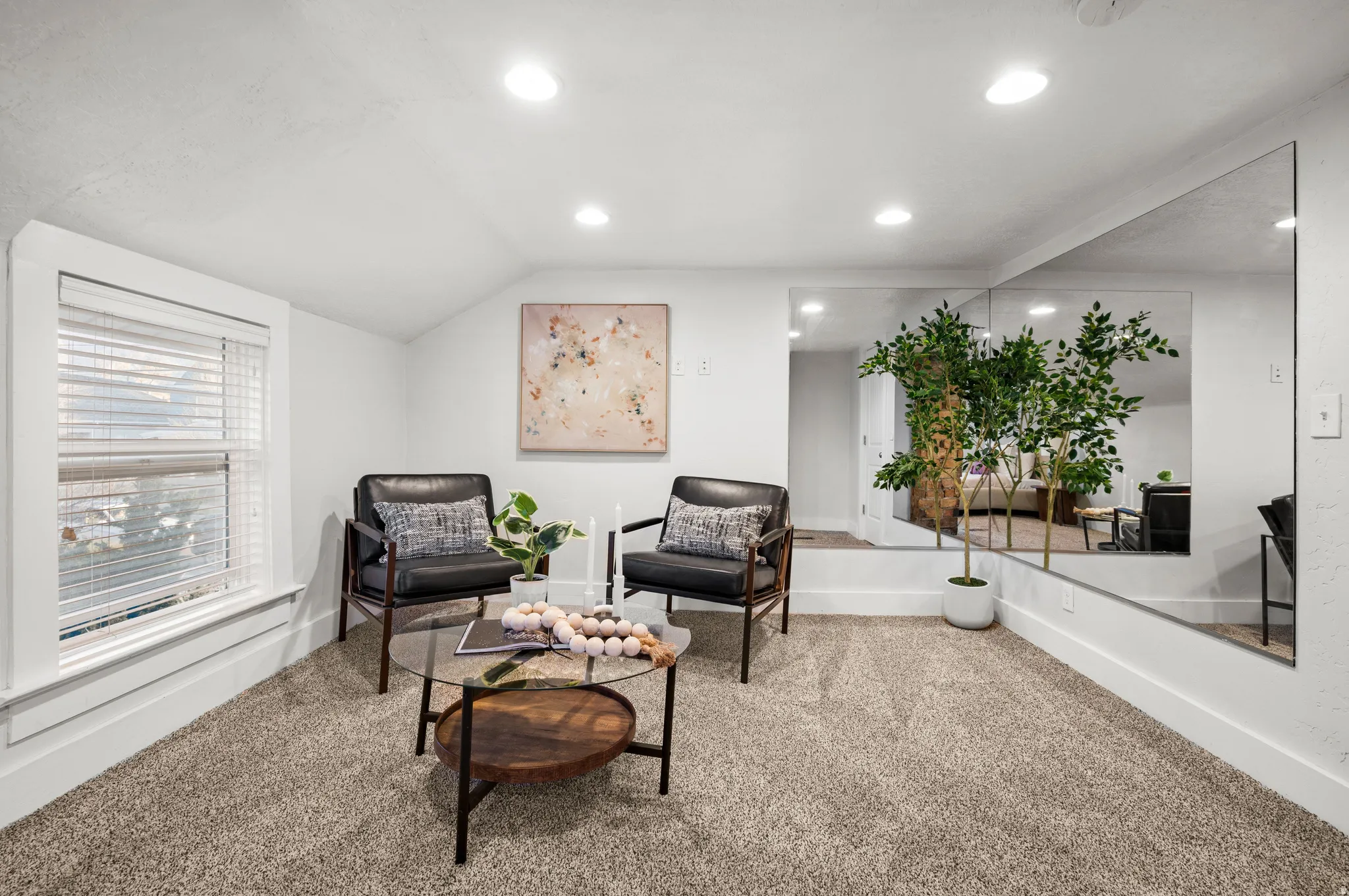 Sitting room featuring carpet floors, recessed lighting, and vaulted ceiling