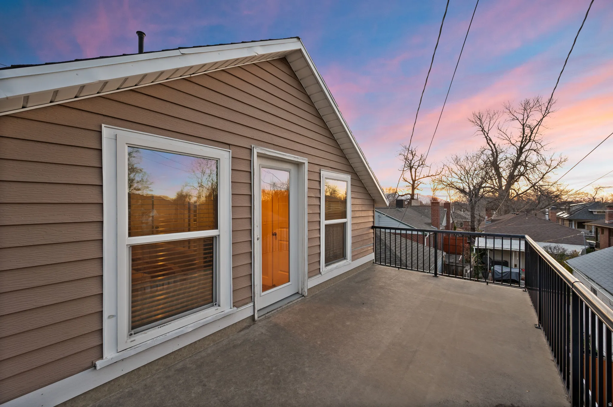 View of balcony at dusk