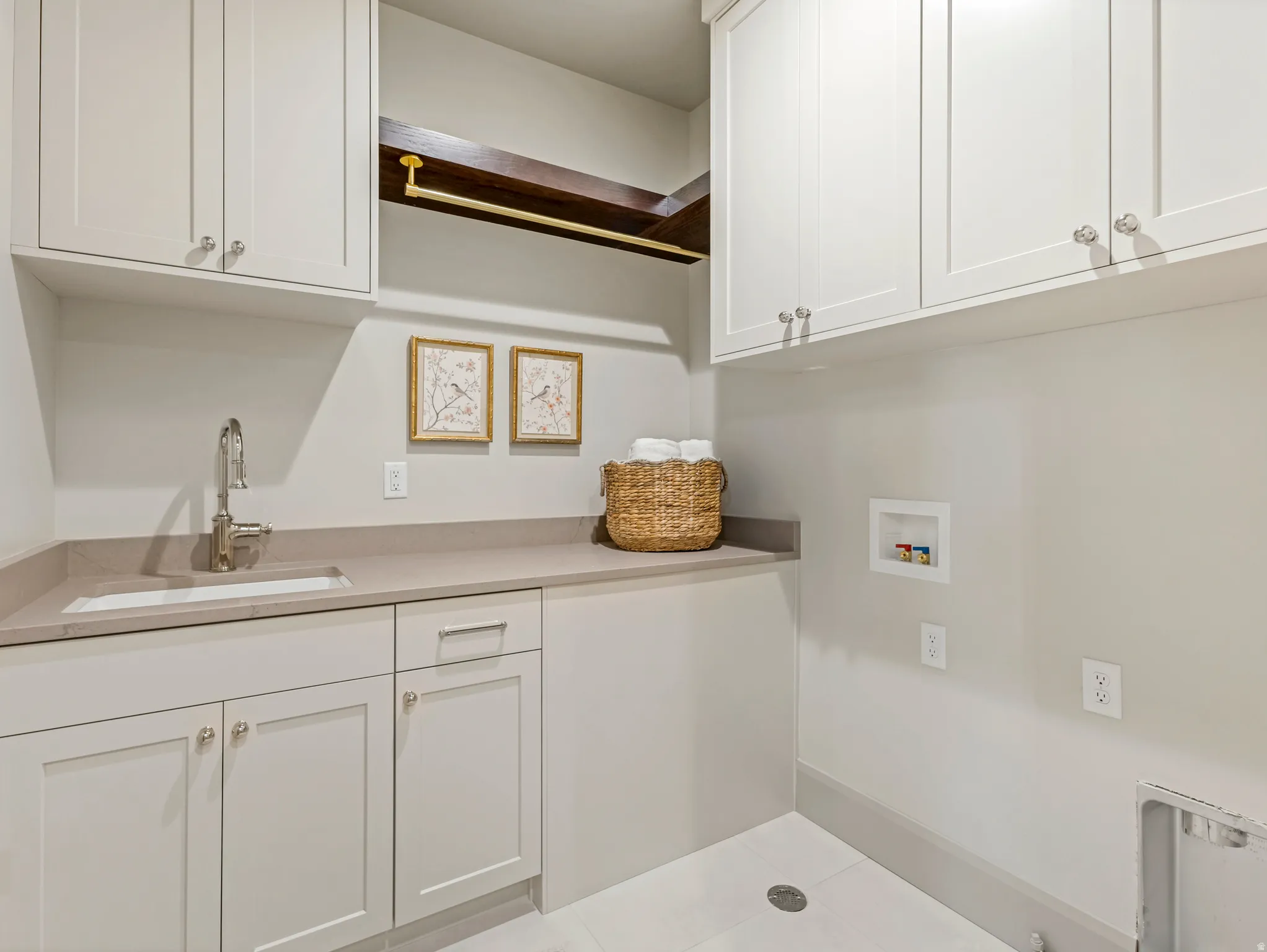 Laundry area with cabinet space and washer hookup