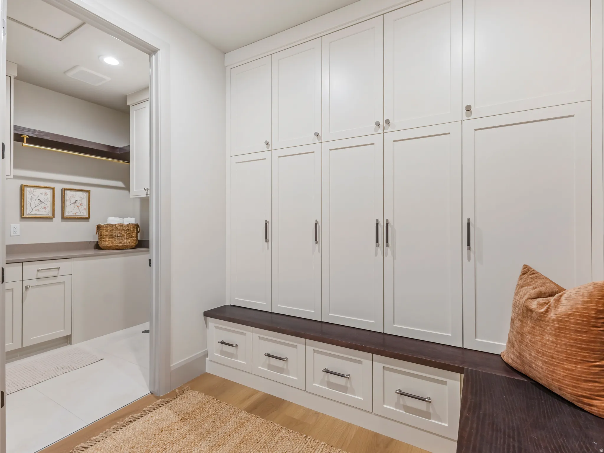 Mudroom with recessed lighting and light wood finished floors