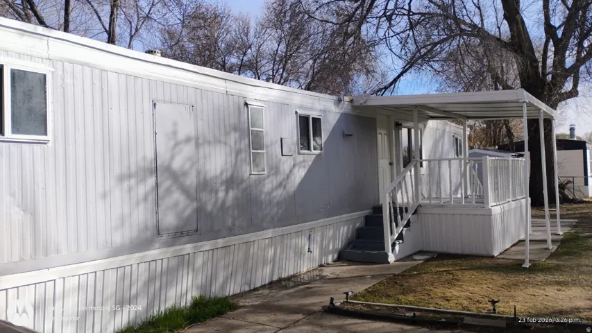 View of home's exterior featuring a deck